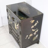 Black lacquered Chinese buffet with stone and ivory figures