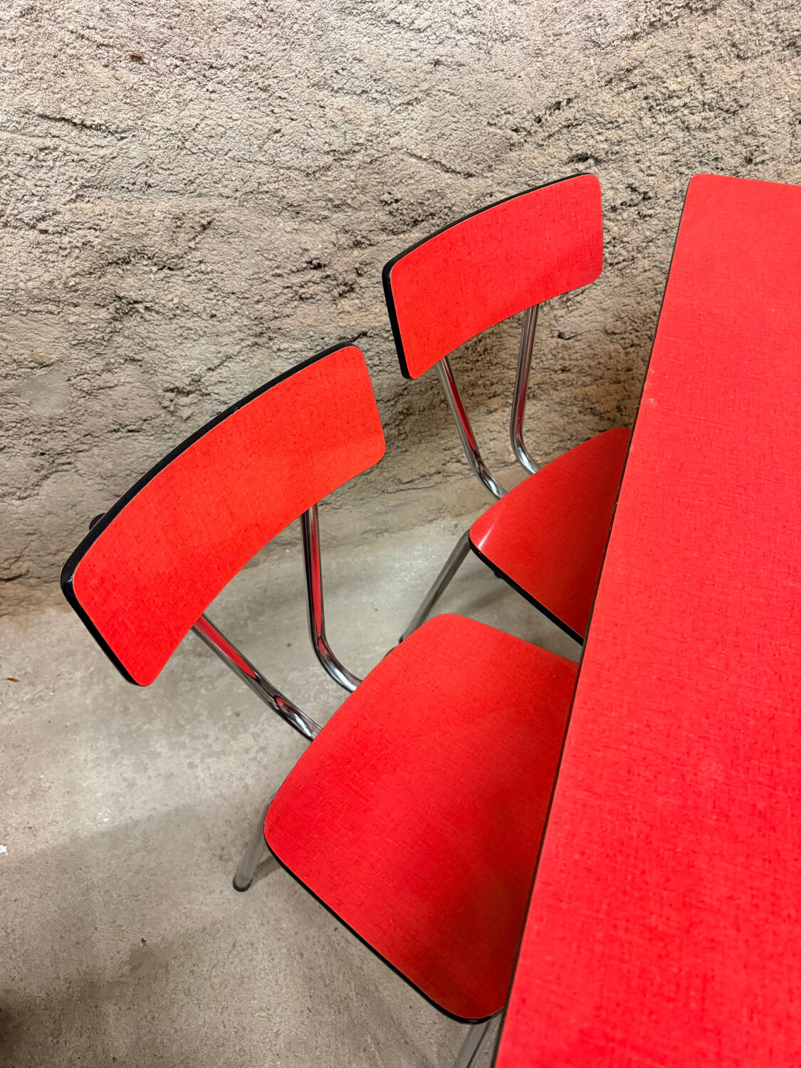 4 red Formica chairs with a 1970s table