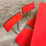 4 red Formica chairs with a 1970s table