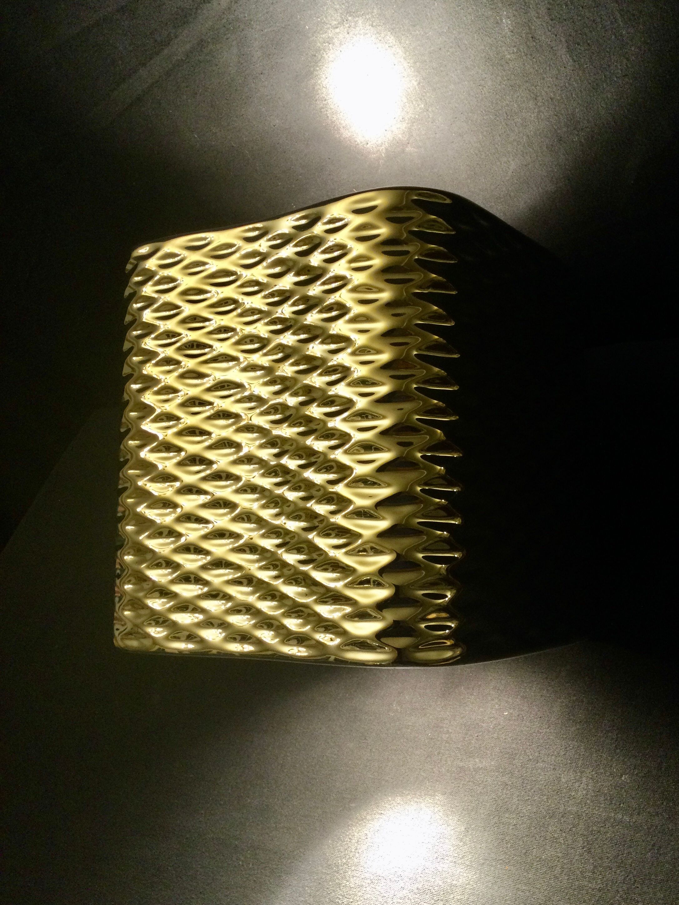 Golden ceramic cube wall light