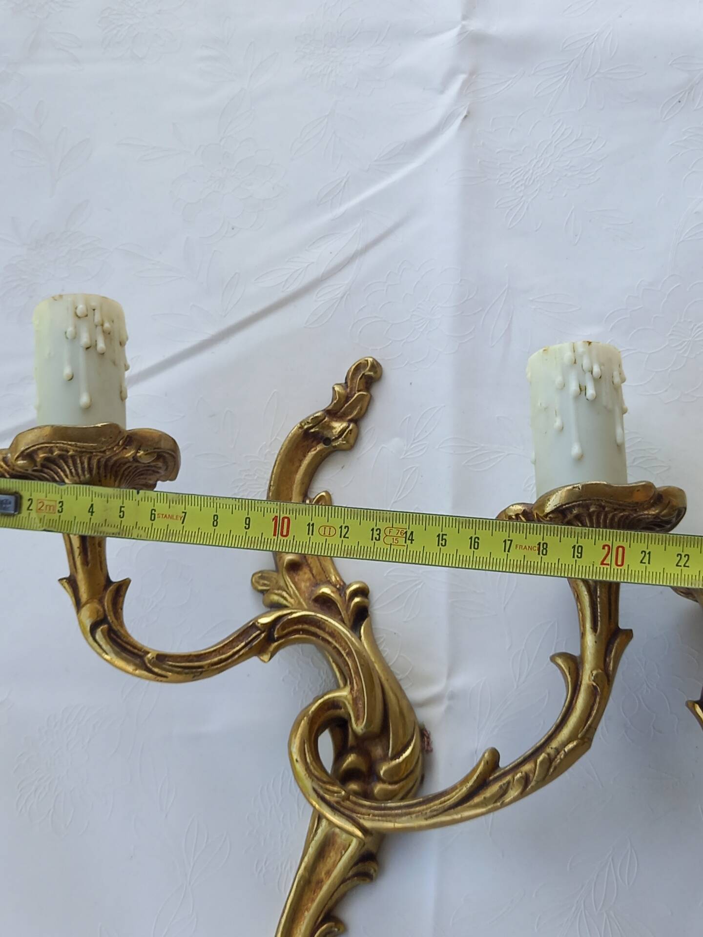 Old pairs of bronze wall sconces