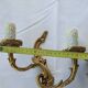 Old pairs of bronze wall sconces