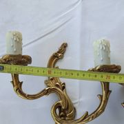 Old pairs of bronze wall sconces