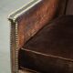 Art Deco design armchair finished in velvet and fitted with decorative nails
