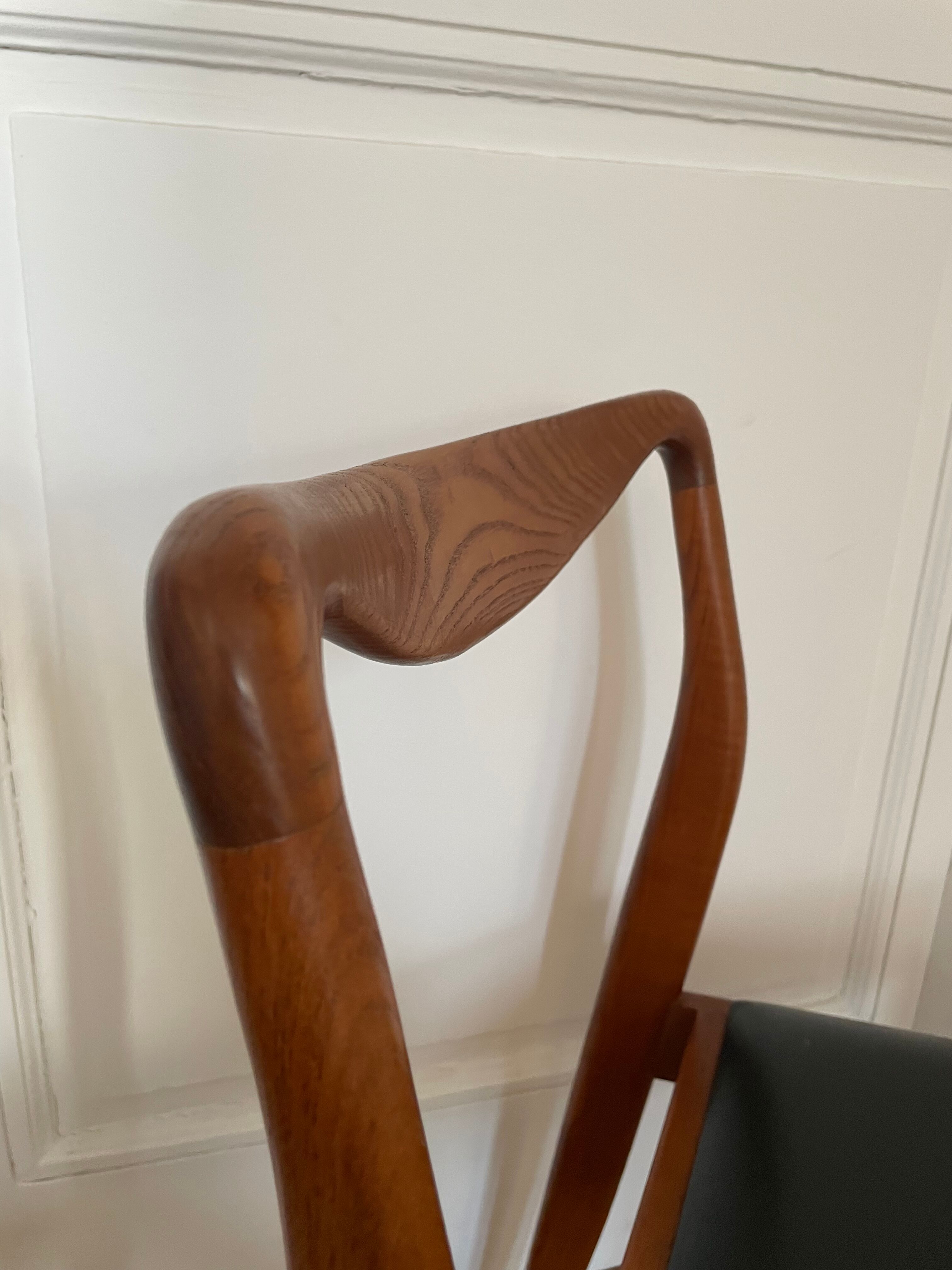 Pair of Scandinavian chairs in teak and skaï, 1965