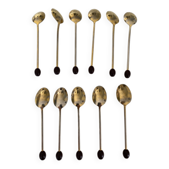 Golden teaspoons with coffee bean tip