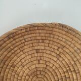 Ethnic plateau in woven palm leaf
