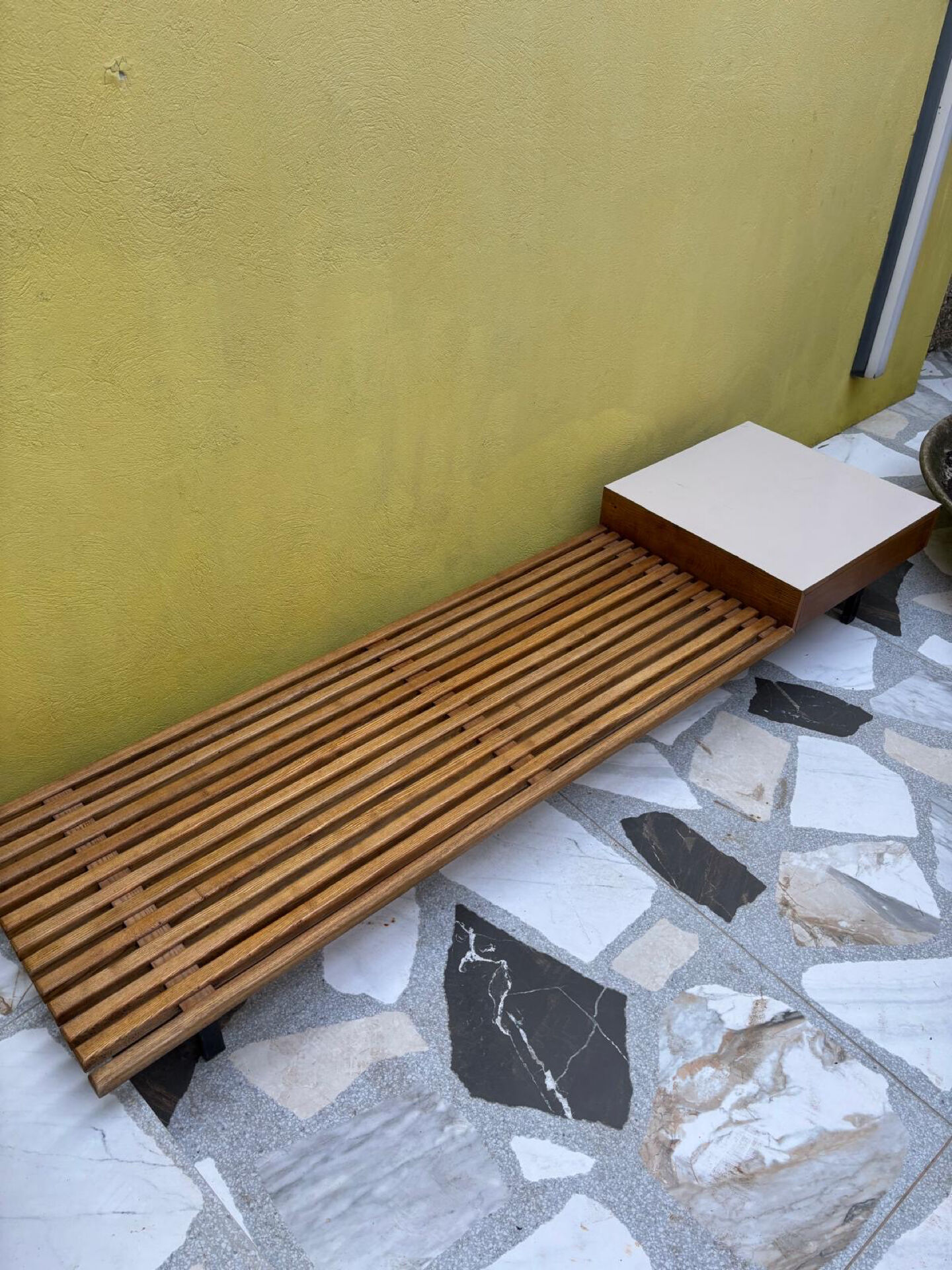 Banquette with storage by Charlotte Perriand