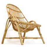 Rattan armchair with armrest from the 60s-70s.