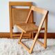Pair of canned folding chairs.