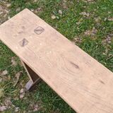 Old farm bench in chene