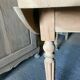 Oval wooden table on wheels.