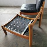 Pair of designer leather armchairs 80s