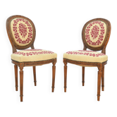 Paire de chaises de style Louis XVI