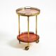 Round, small 1960s Aldo Tura serving or bar trolley in red goatskin leather