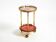 Round, small 1960s Aldo Tura serving or bar trolley in red goatskin leather