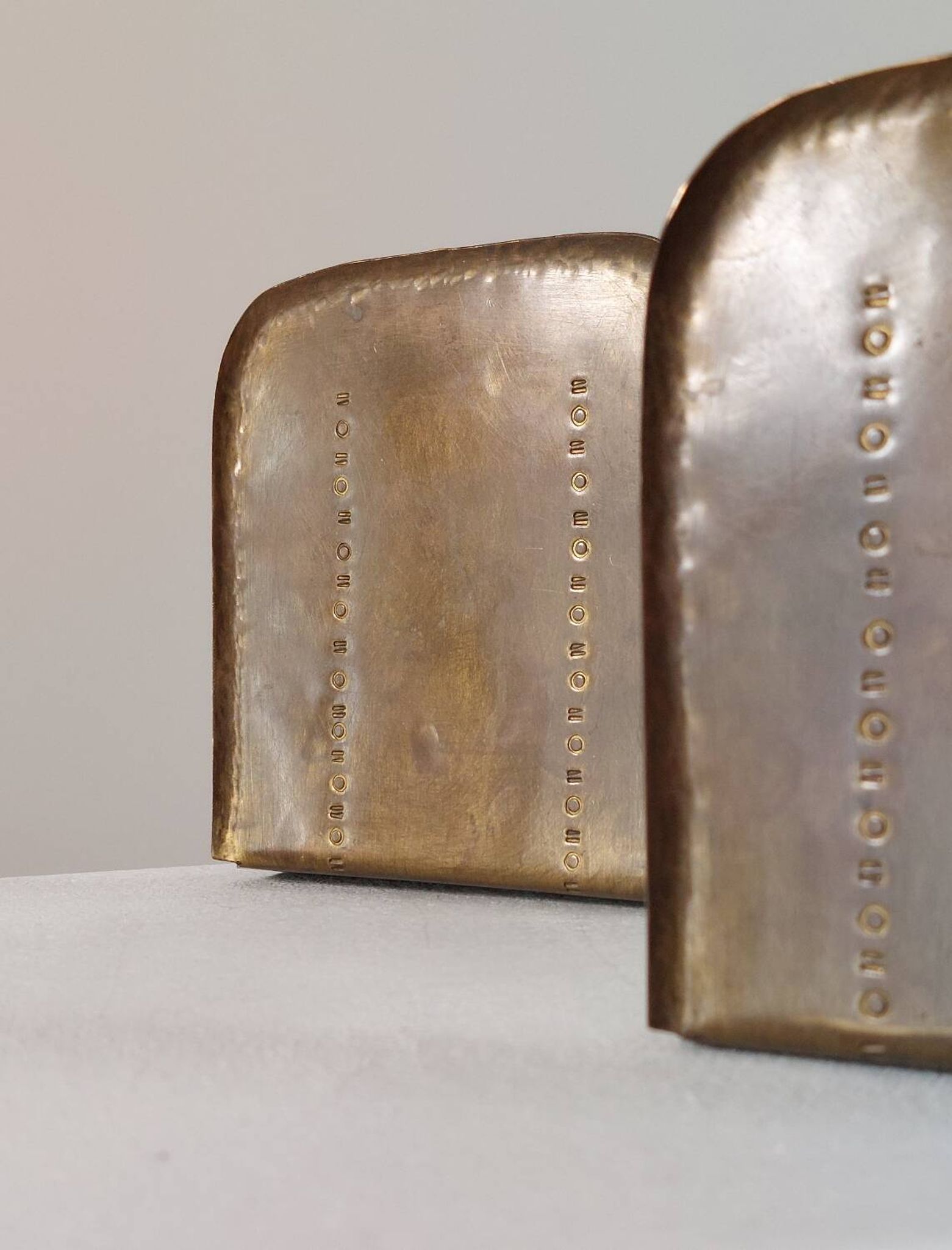 Pair of hand-hammered brass bookends by Hayno Focken
