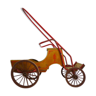 Old cart, cart for bicycle, child tractor made of wood and metal. Year 60
