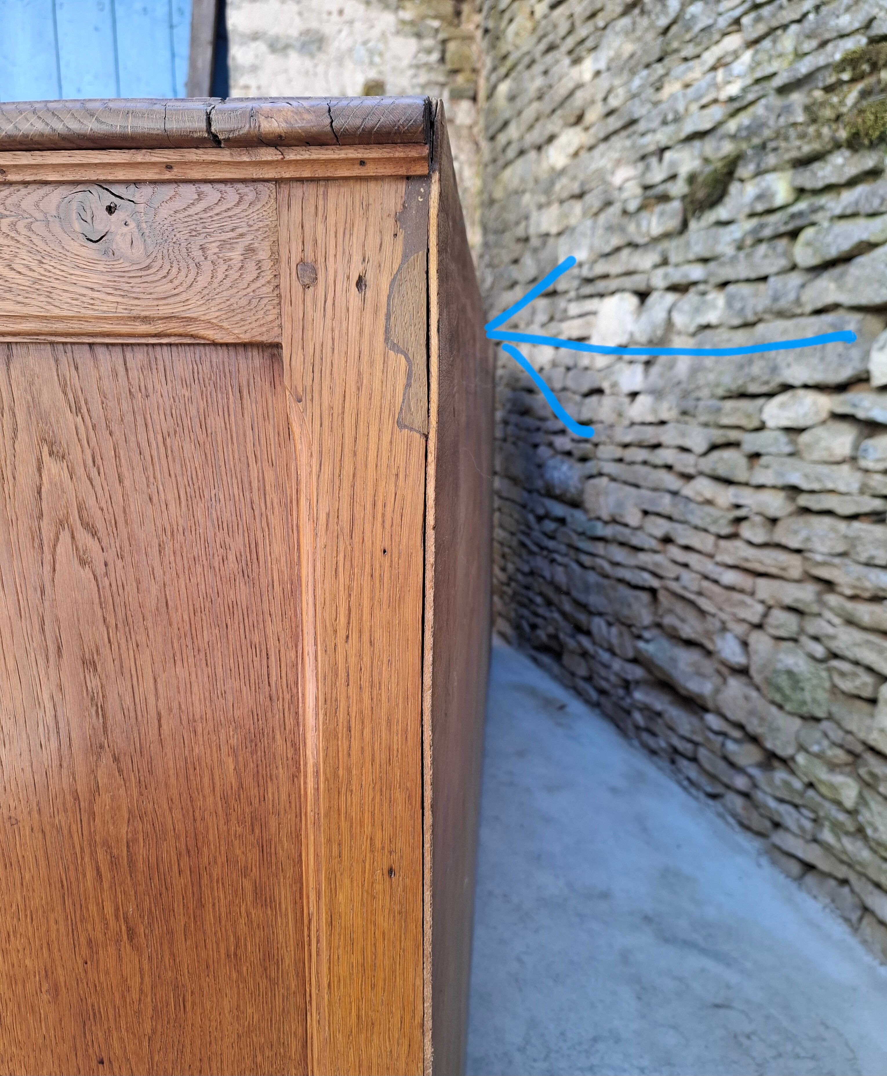 Oak workshop furniture with sliding doors.