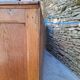 Oak workshop furniture with sliding doors.