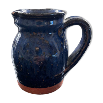 Old blue pitcher signed