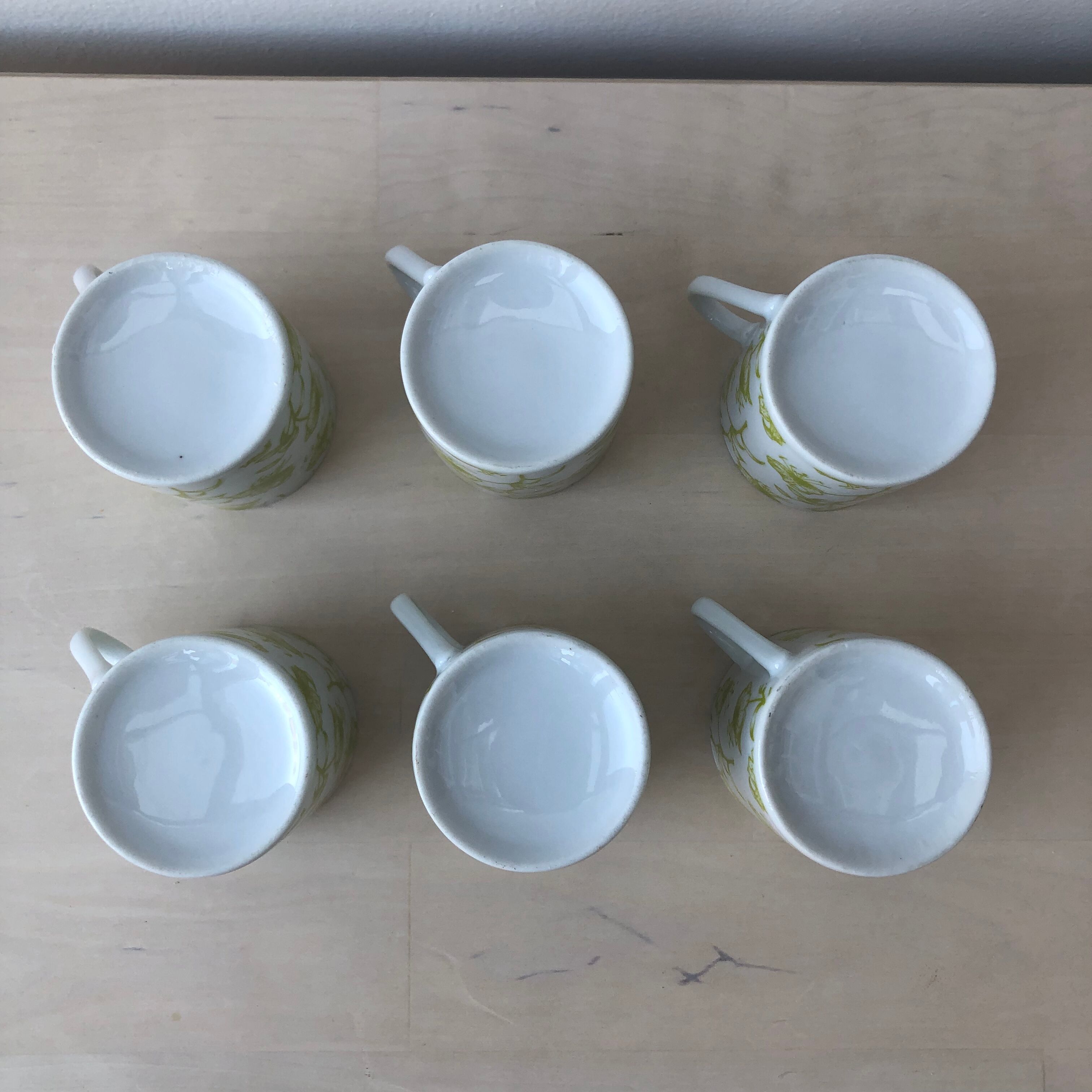 Porcelain coffee cups, green flower patterns