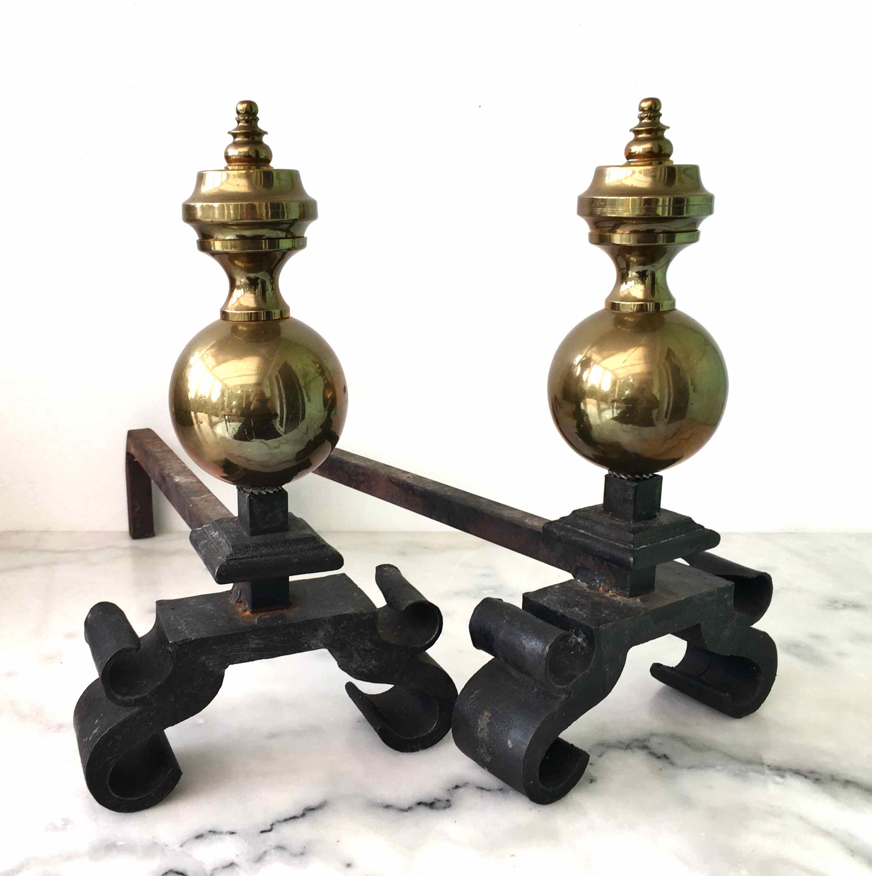 Old cast iron and brass bedside tables