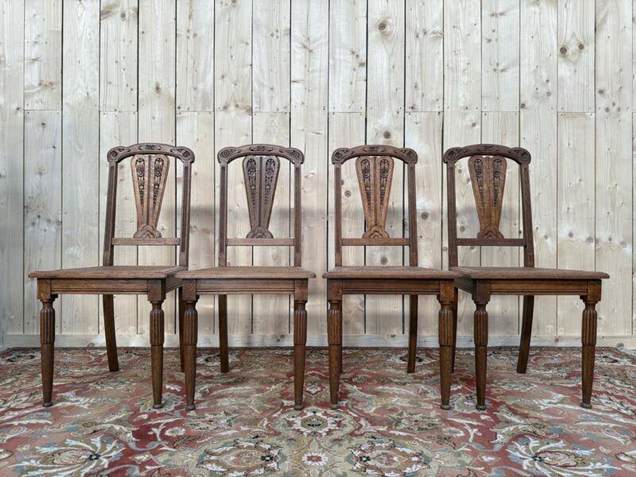 Suite de 4 chaises époque Art Déco en cannage