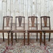 Suite de 4 chaises époque Art Déco en cannage