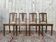 Suite de 4 chaises époque Art Déco en cannage