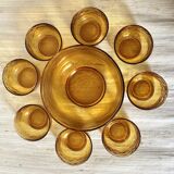 Salad bowl and bowls in amber glass, 70s
