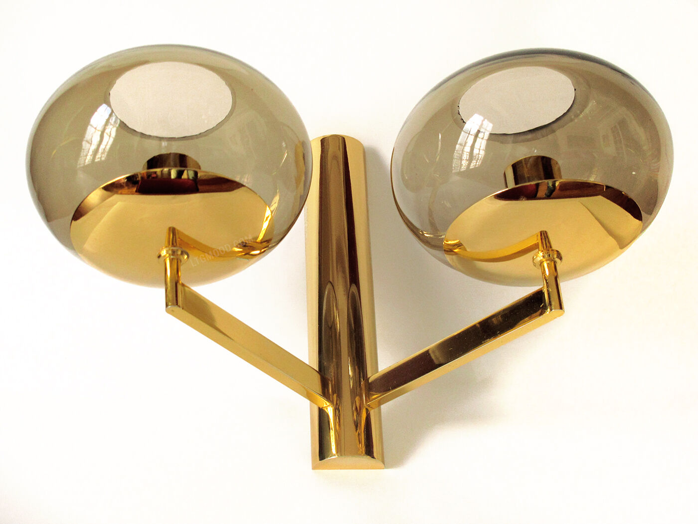 Duo wall lamps. Golden metal and smoked glass from Sciolari 1970