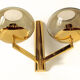 Duo wall lamps. Golden metal and smoked glass from Sciolari 1970