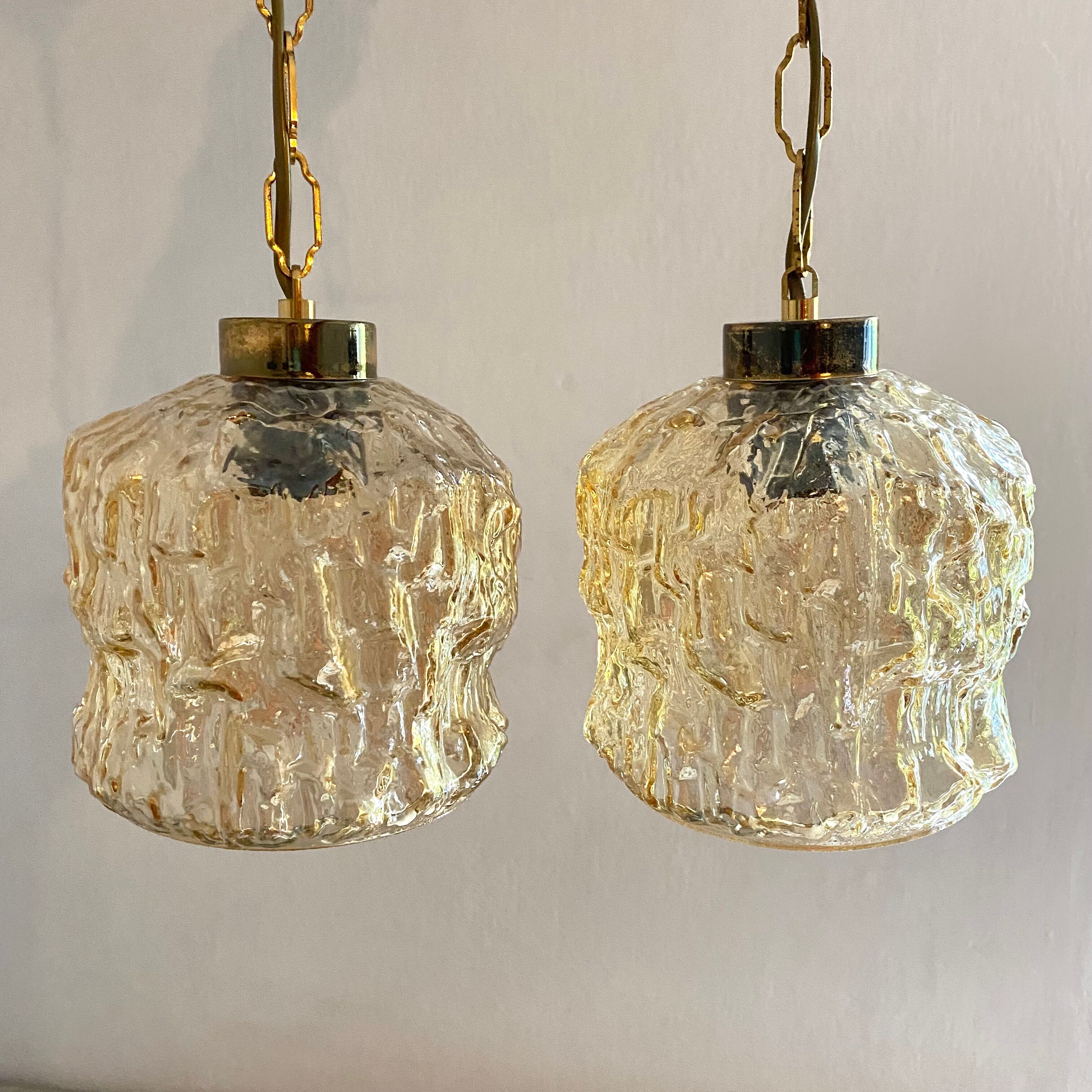Pair of vintage amber glass pendant lamps