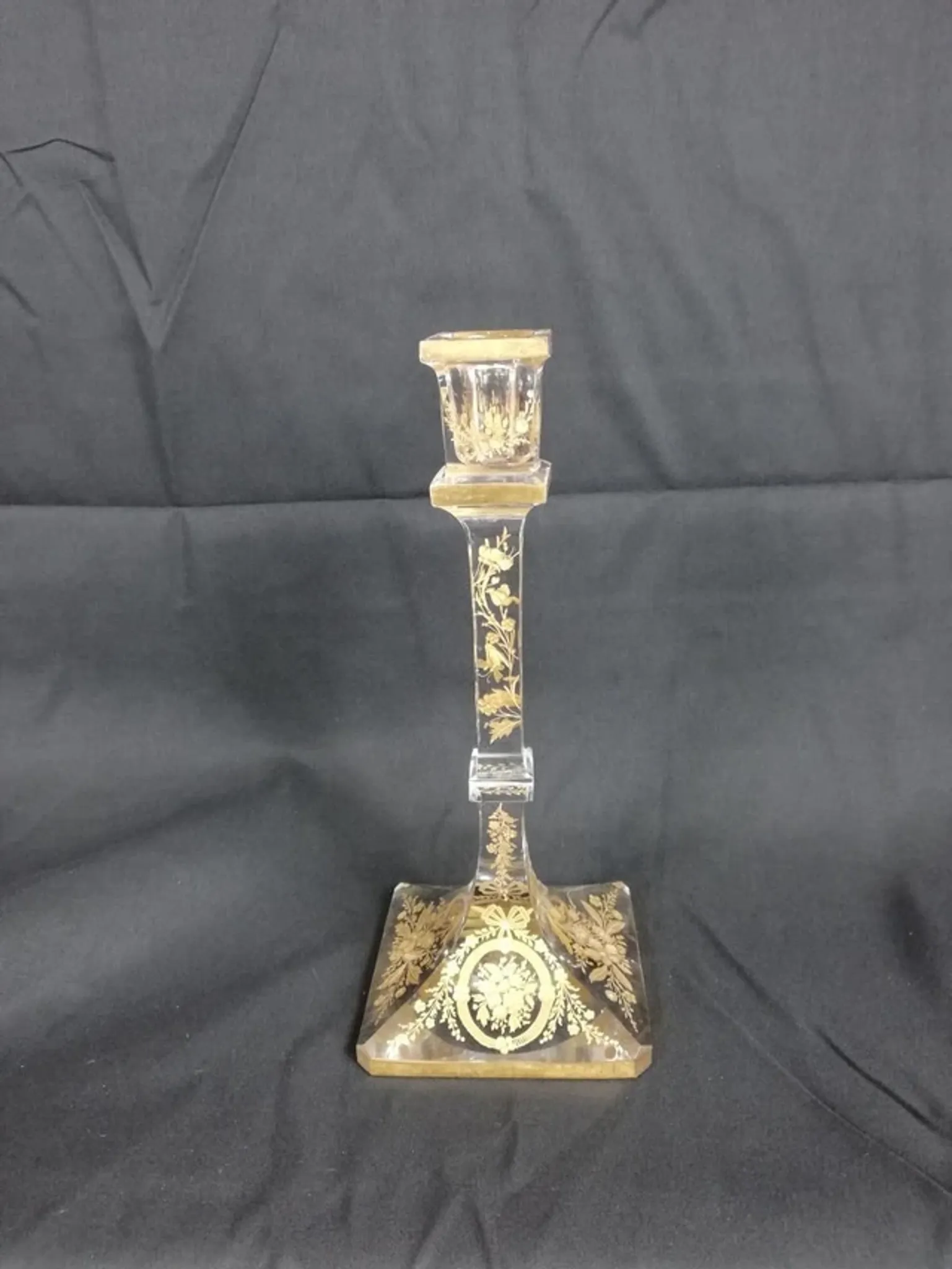 Antique glass candle holder, engraved and gilded.