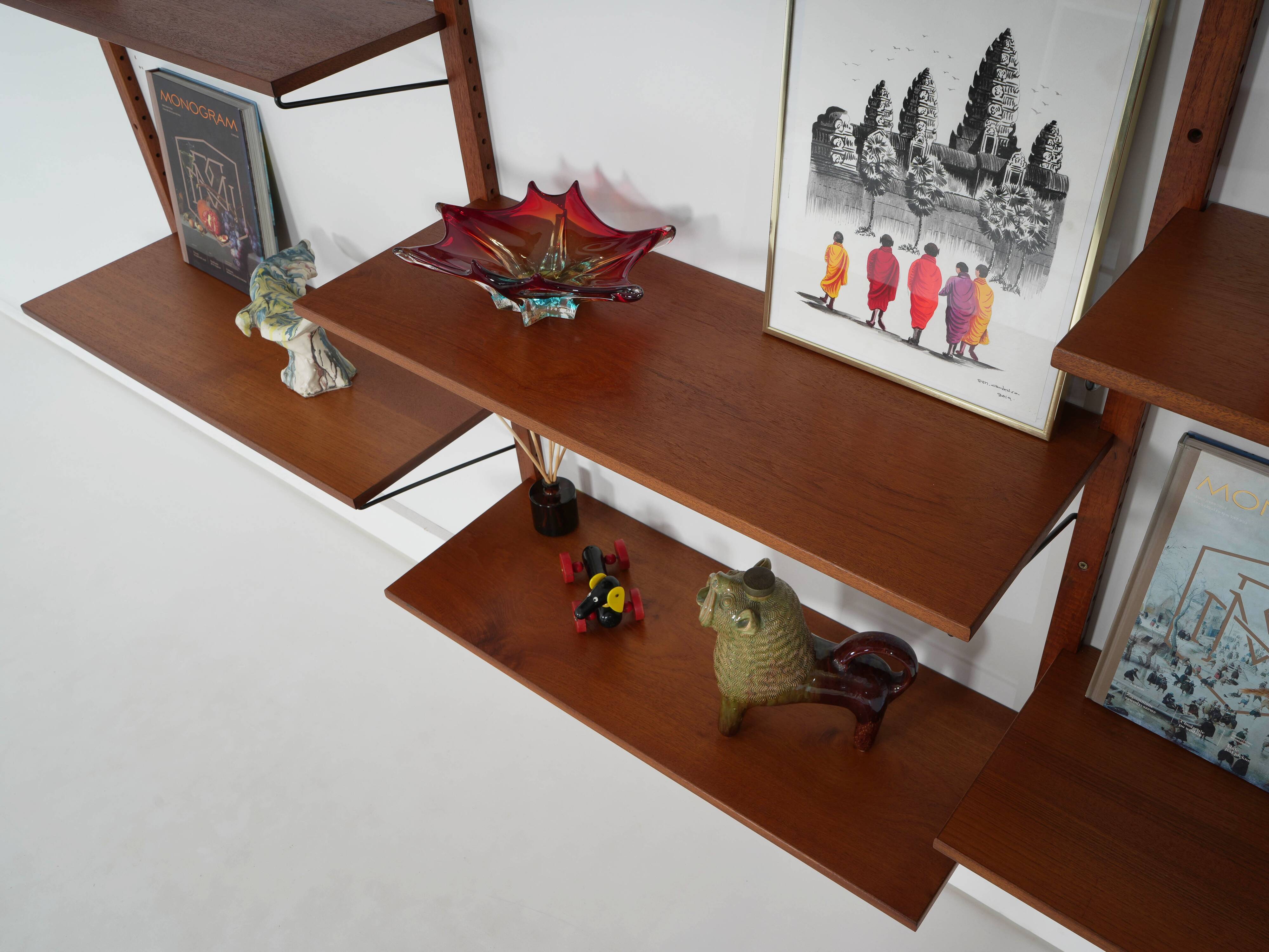 Modular shelving from the 1960s — Danish teak veneer wall system