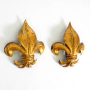 A pair of large 1970s gilt metal Fleur-de-Lis wall lamps by Hans Kögl