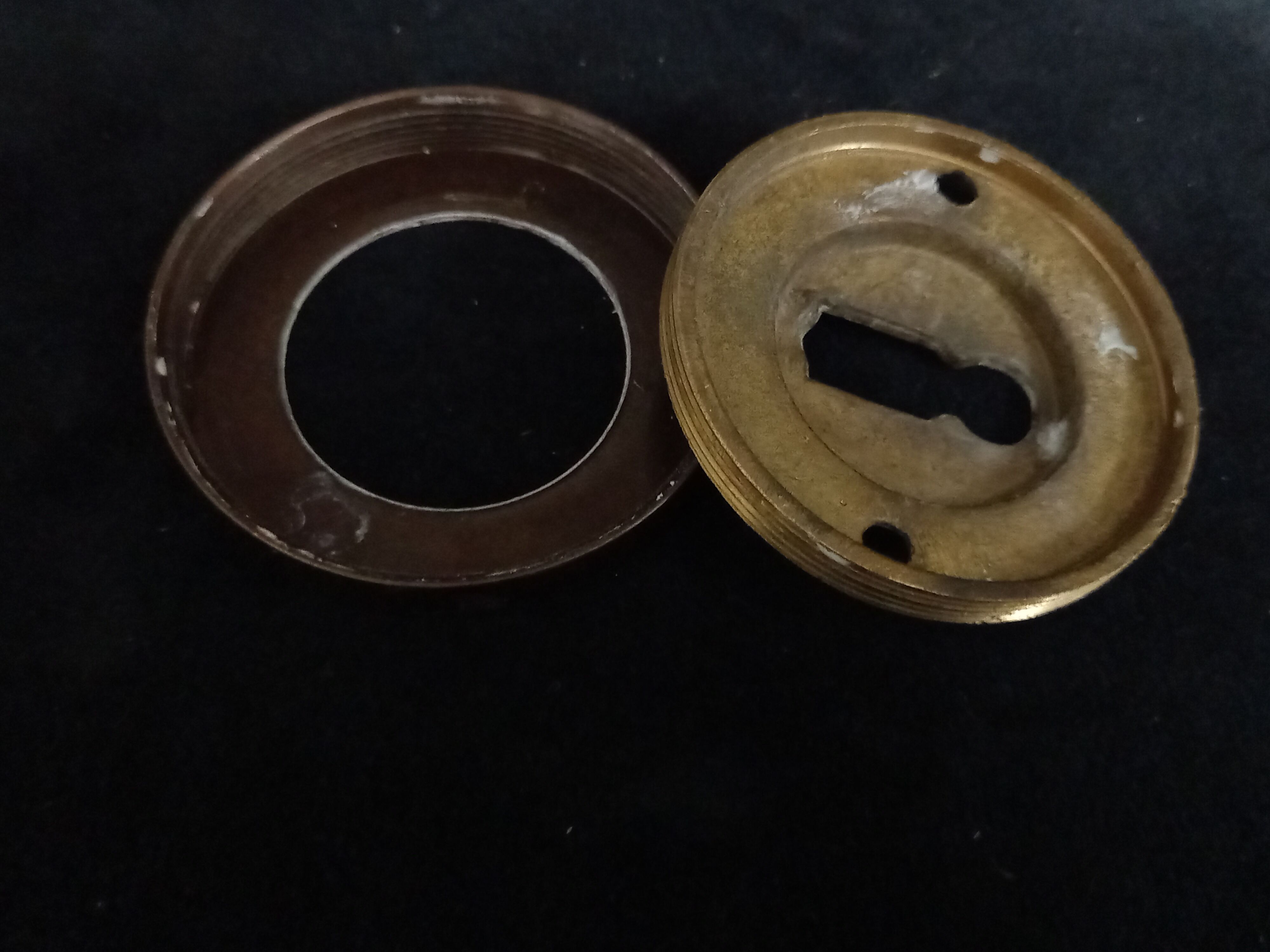 Four pairs of brass door handles with key plates