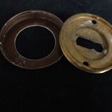 Four pairs of brass door handles with key plates