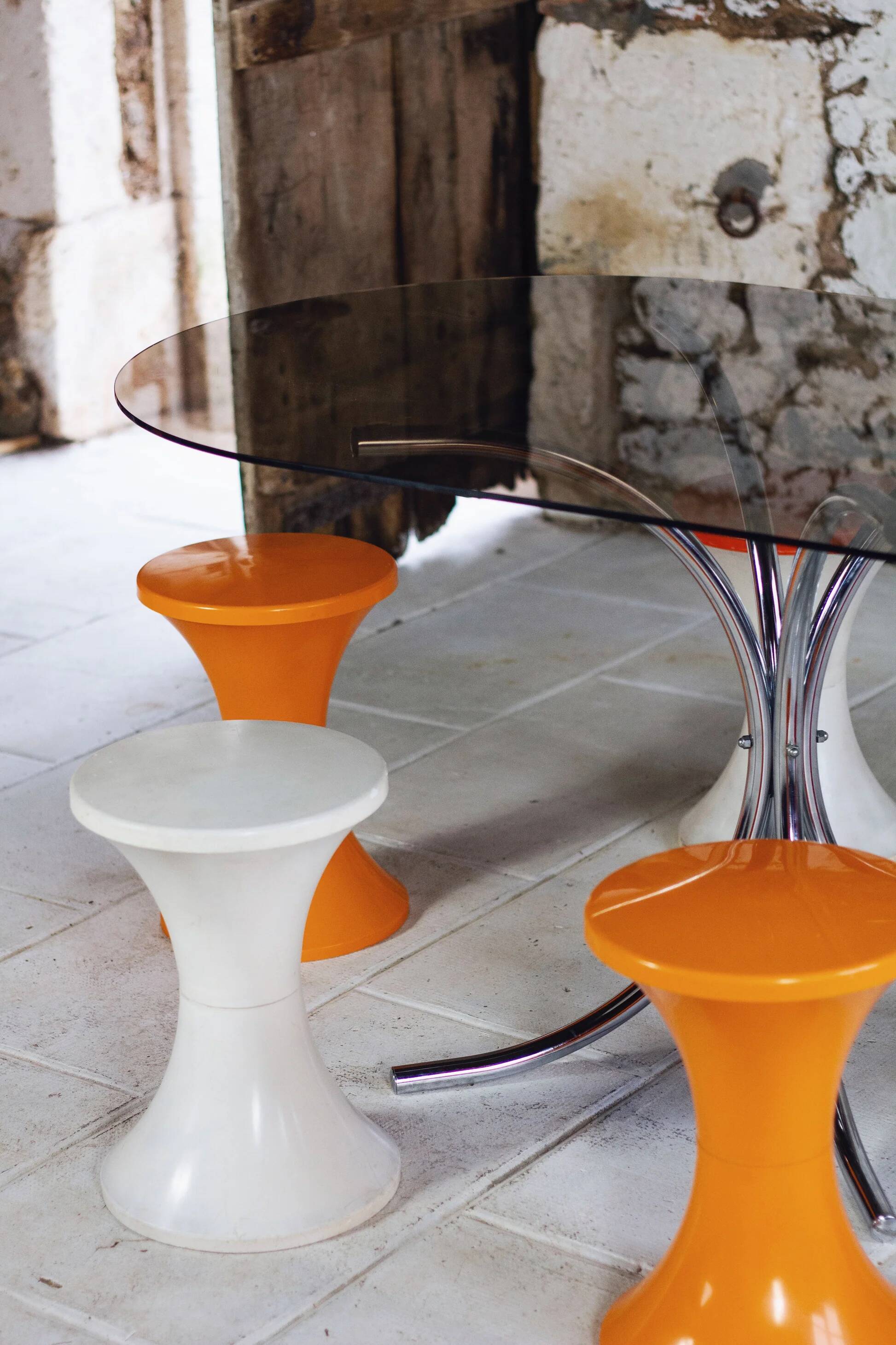Oval dining table in chrome and smoked glass, 1970.