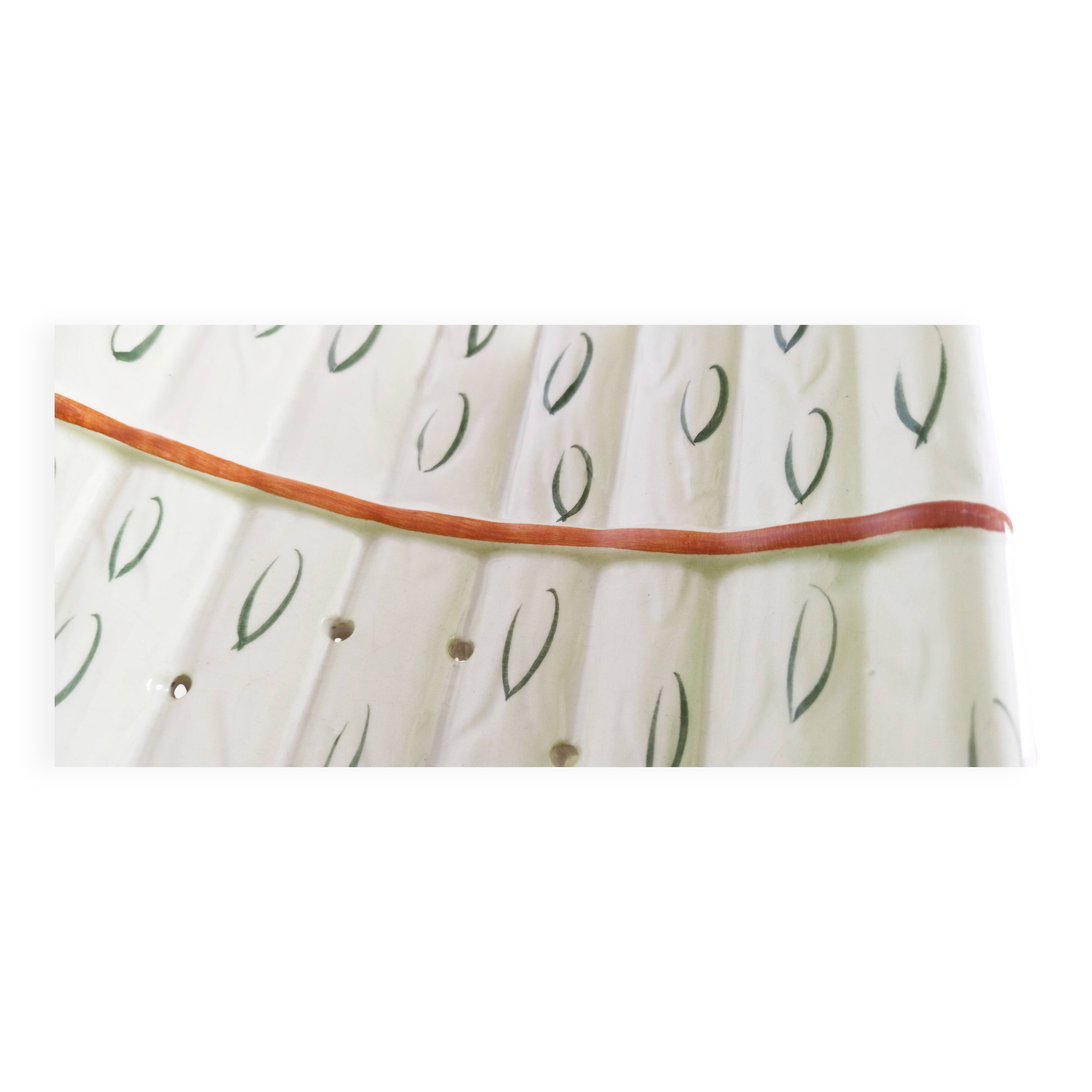 Barbotine earthenware asparagus dish