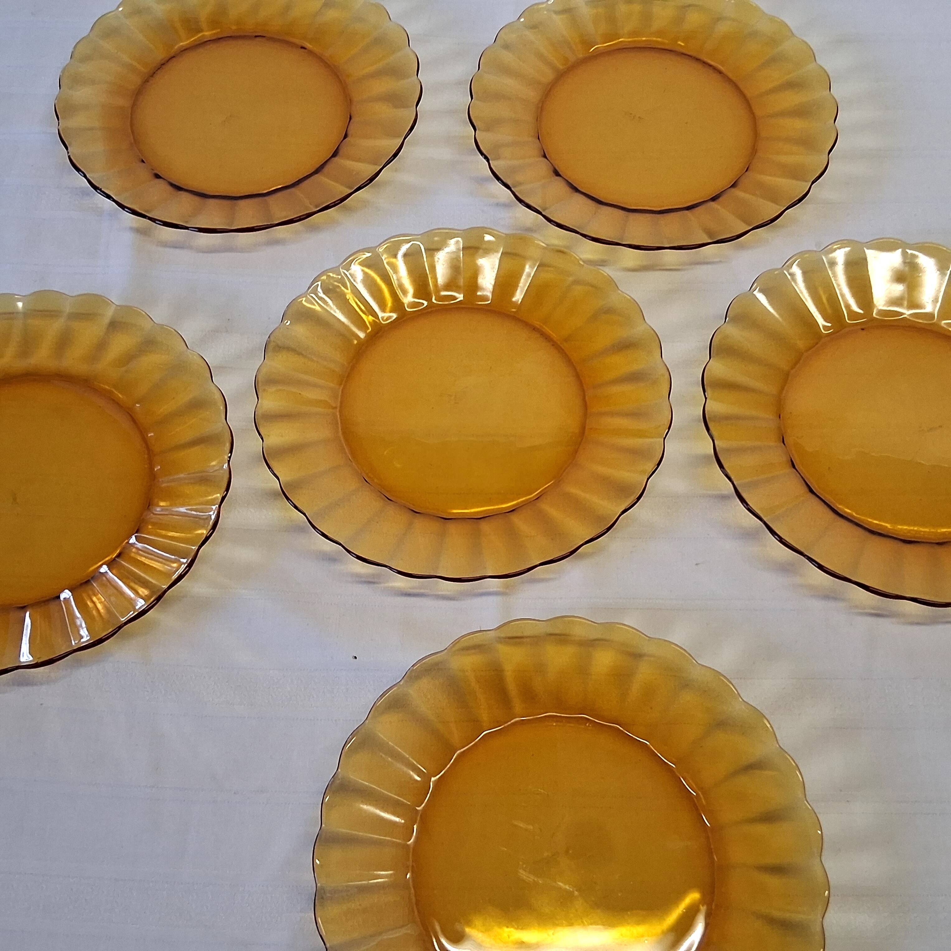 6 Duralex dessert plates in good condition, made of amber-yellow glass