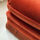 Vintage Jean Roche pouf in orange velvet with fringes