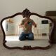 Pair of large antique Rococo style Louis XV mirrors in carved solid wood.