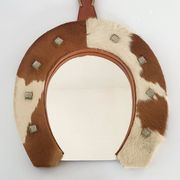 Vintage 1970s cowhide horseshoe mirror