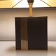Lampe années 70 en laiton doré et cuir noir