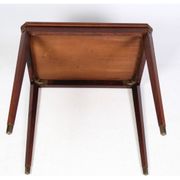 Side table decorated with bronze ornaments in light mahogany