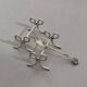 Set of six silver-plated ribbon-shaped knife rests. 20th century