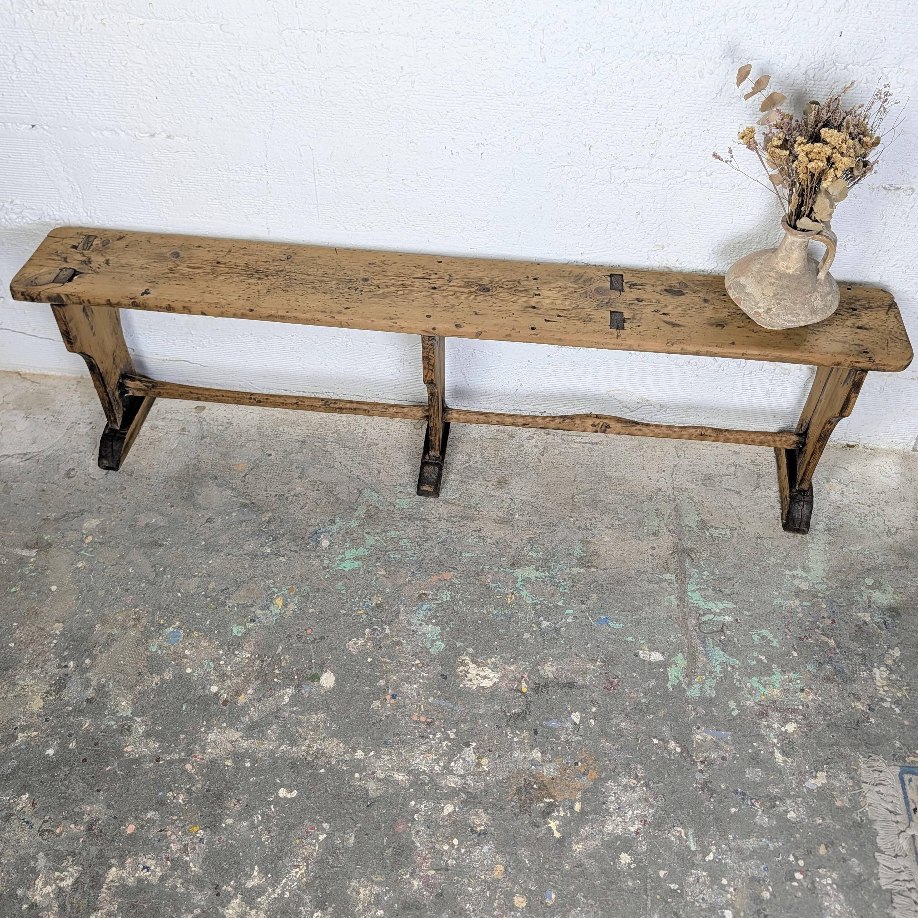 Old farmhouse bench in raw wood