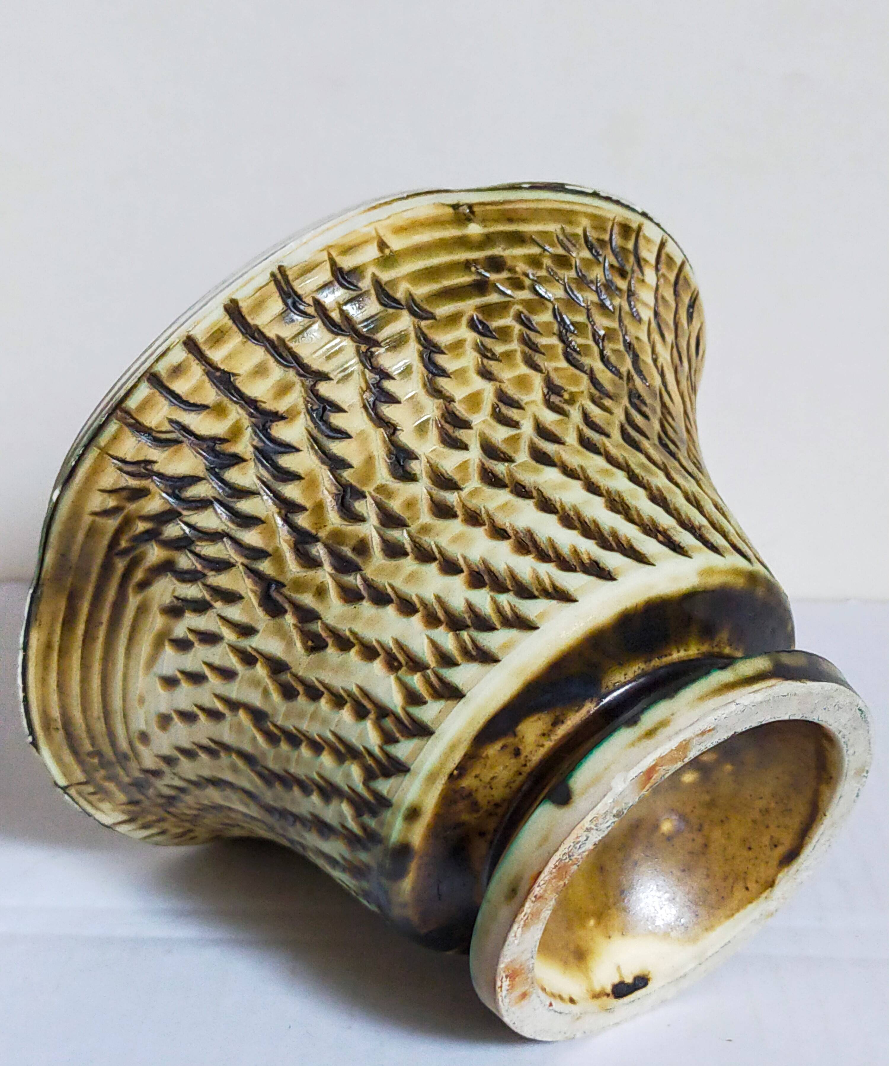 Ceramic planter with vintage scarifications from the 1950s